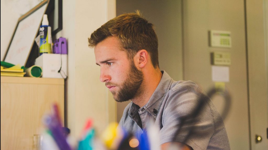 man at work concentrating 