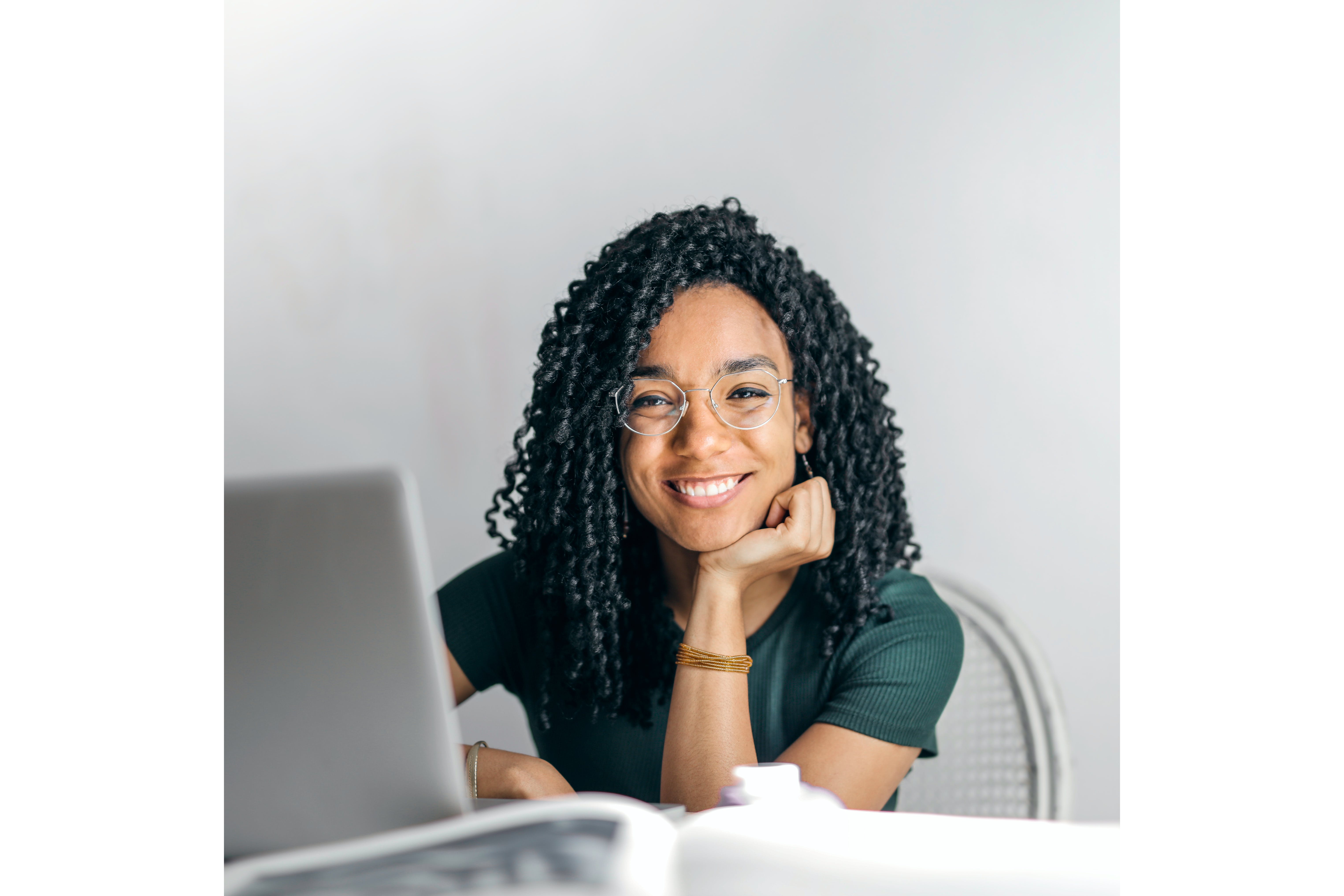 woman smiling after online therapy